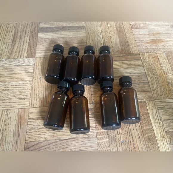 Essential oil bottles. 8 bottles included. Will need cleaned out - Picture 2 of 3
